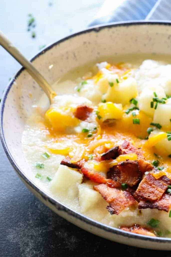 This Potato Soup is smooth and creamy. Loaded with chunks of potato. Plus it's secretly healthy, made with no milk or cream! 