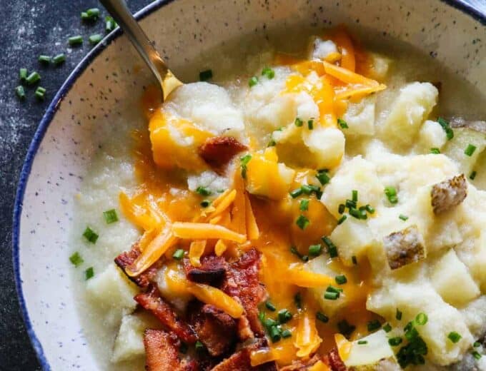 This Potato Soup is smooth and creamy. Loaded with chunks of potato. Plus it's secretly healthy, made with no milk or cream!