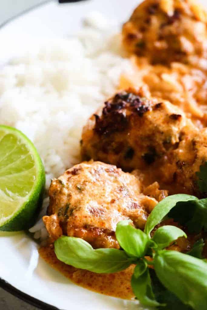 Chicken Curry Meatballs. Curry Spiced ground Chicken meatballs smothered in a creamy curry sauce with a hint of lime and sweetened with honey. This clean eating meal is sure to be a new favorite! 