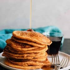 Soft and fluffy sweet potato pancakes made to the extreme with an overdose of spices and sweetened with maple syrup. Fall breakfast perfection.