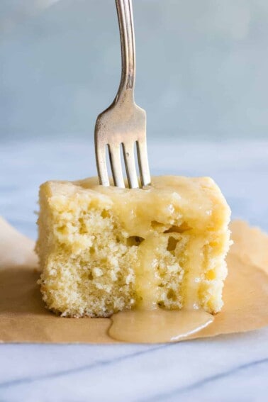 Butter Rum Sheet Cake. This light and fluffy homemade yellow cake has rum baked in and is drenched in a butter rum sauce. Even though this cake is sized down it still has full sized flavor! 