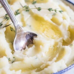 The creamiest mashed potato loaded up with garlic and herbs in every bite! Perfect side dish for any meal.