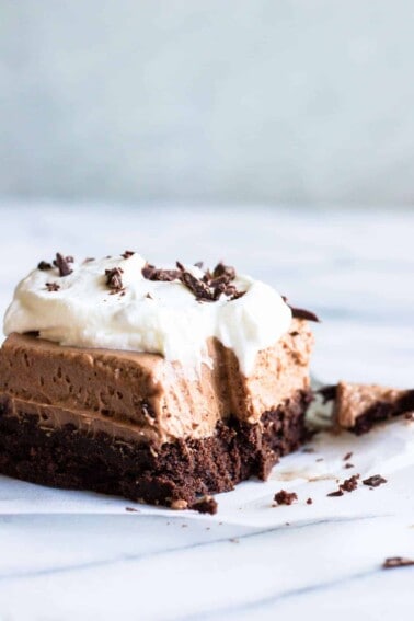 Brownie topped with a layer of French silk and whipped cream.