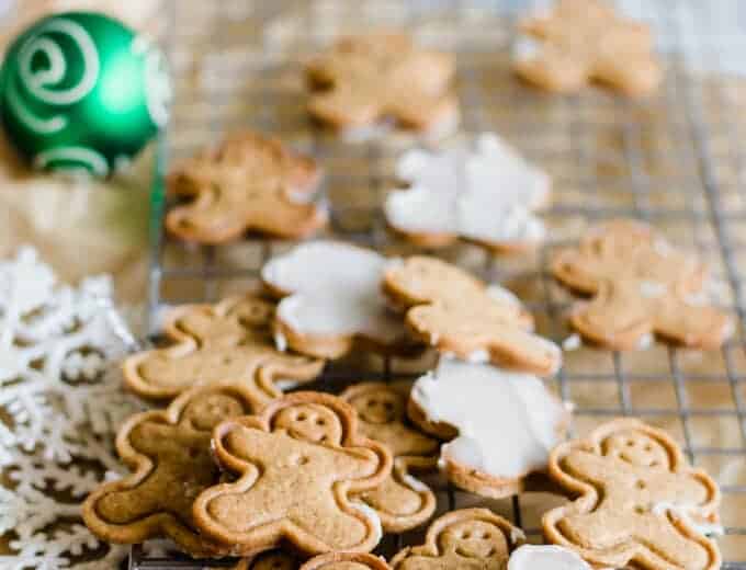 Gingerbread Cookies with White Fudge Icing. These little gingerbread cookies are soft and crisp, perfectly sweet and spiced with cinnamon and ginger. The finishing touch is the white fudge icing on the back! A homemade take on a market favorite! 