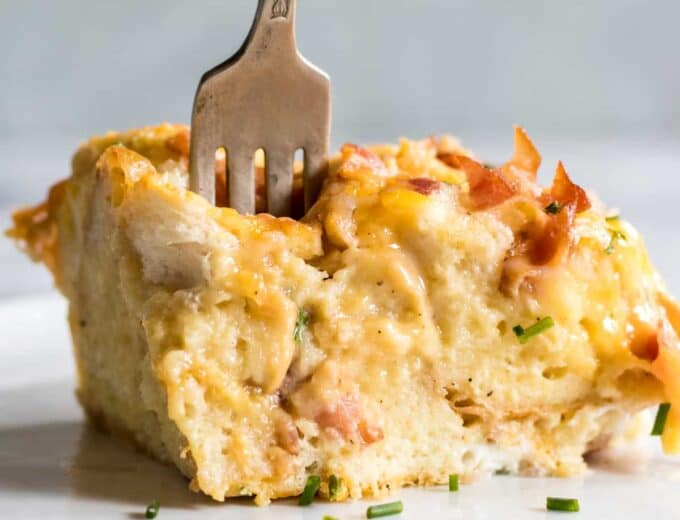 Overnight Bacon and Cheese Strata. This prep ahead breakfast is loaded with eggs, bacon and cheese.