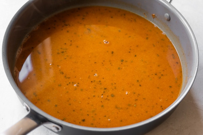 Finished enchilada sauce in a large saucepan.