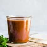 Jar of homemade enchilada sauce recipe.