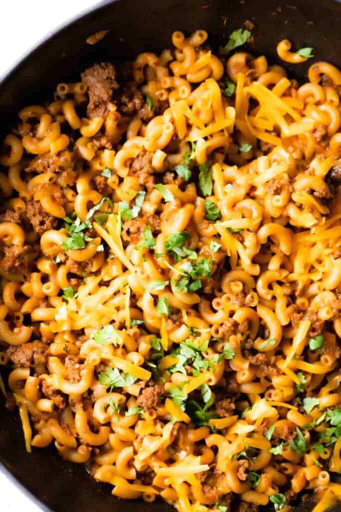 Skillet filled with taco pasta.