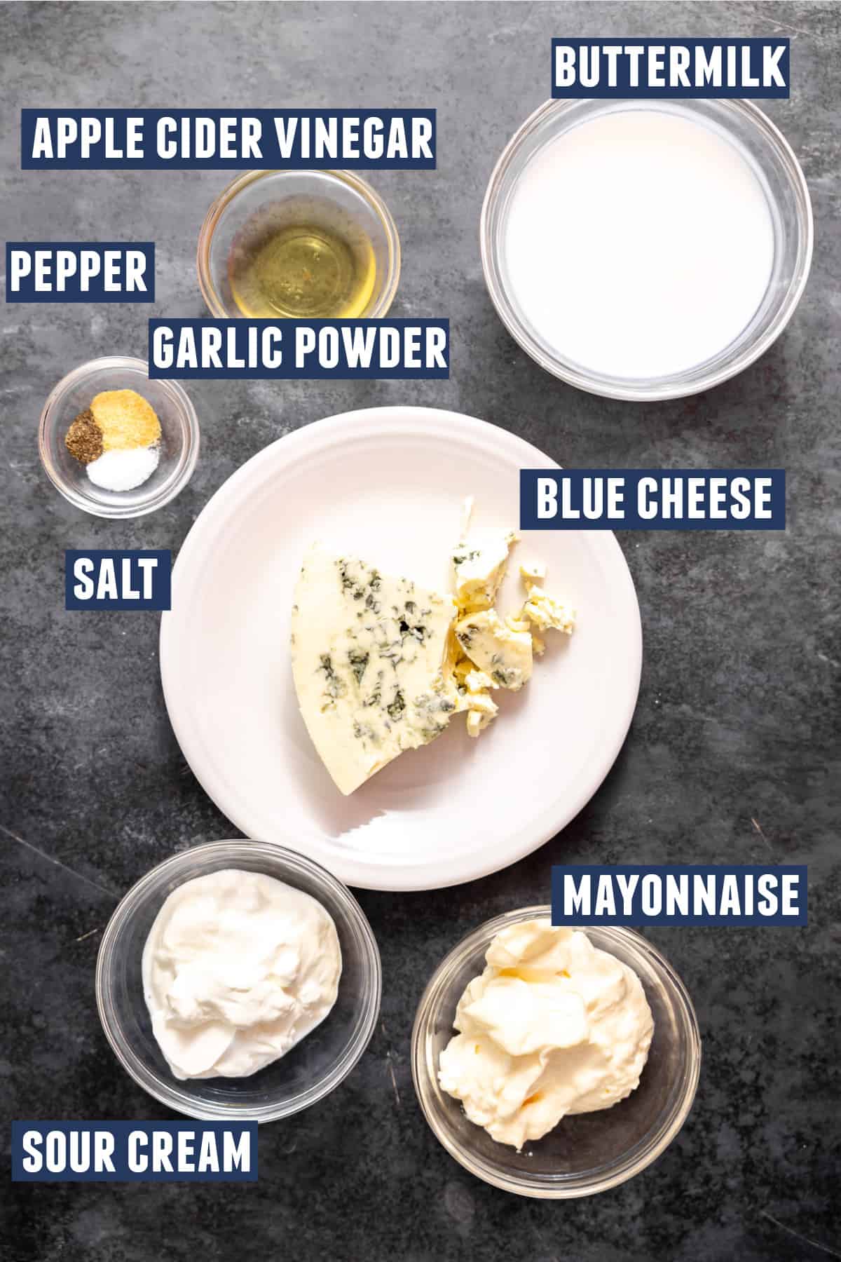 Ingredients needed to make homemade blue cheese dressing.
