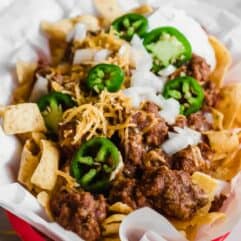 Tray filled with Frito pie made with 20 minutes Texas chili.