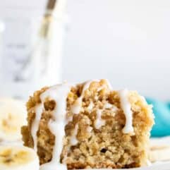 Slice of Banana Bread Crumb Cake with a drizzle of icing.