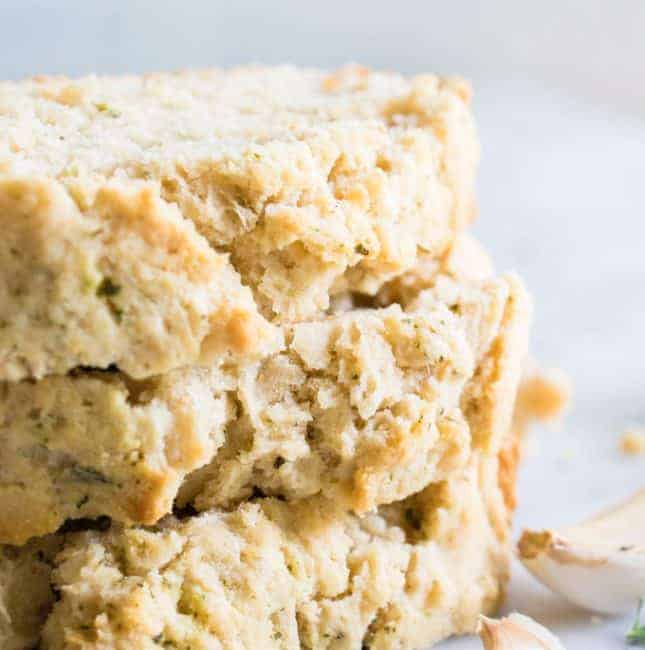 A stack of homemade garlic herb beer bread.