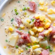 Close up of hearty corn chowder made with ham and potato.