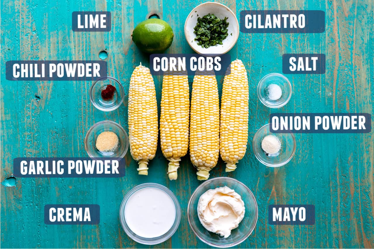 Ingredients needed for making elotes, grilled mexican street corn, laid out on the counter.
