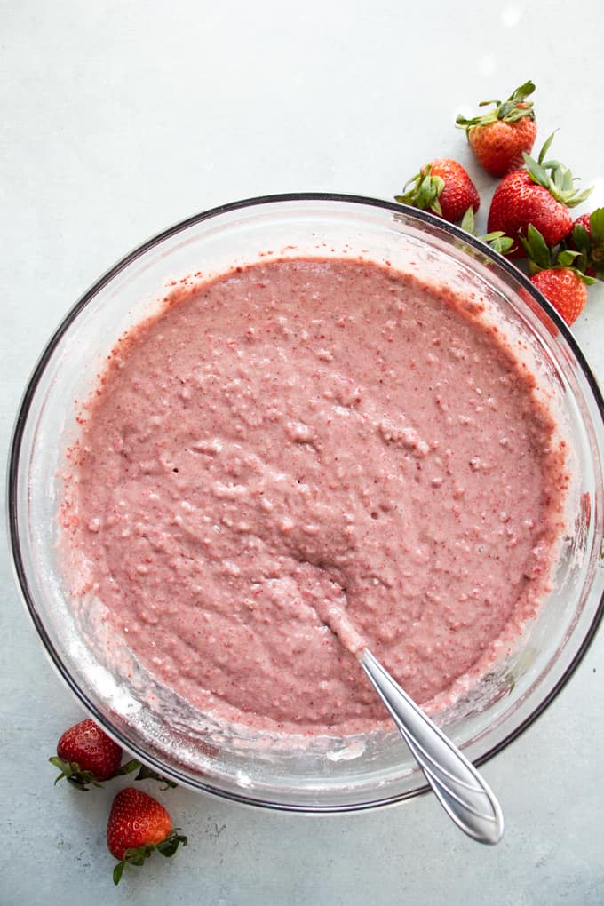 Pink colored fresh strawberry cake batter.