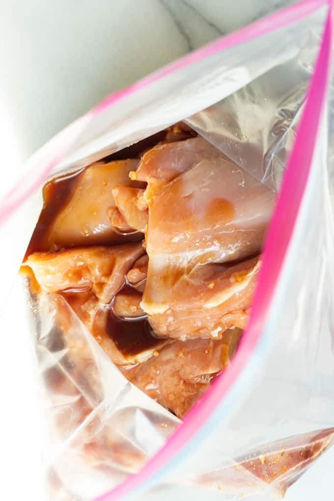 Bag filled with chicken and Huli Huli marinade to make Hawaiian Chicken.