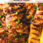 Hawaiian chicken with grilled pineapple on the side.