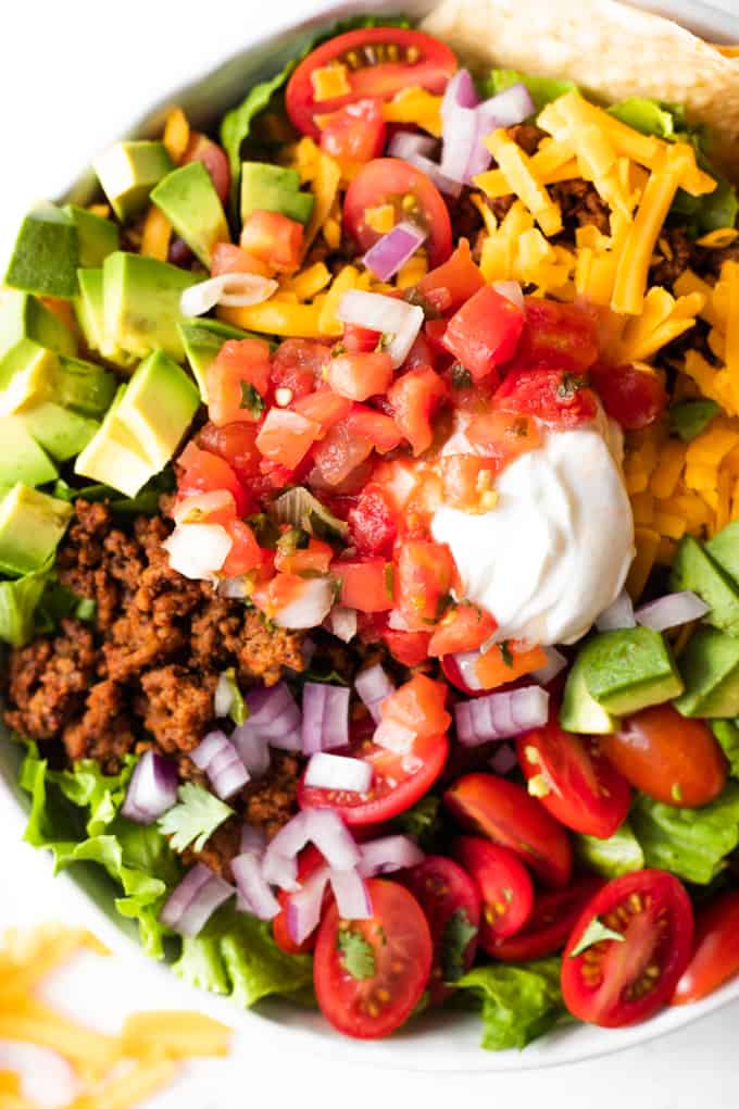 A bowl filled with easy taco salad. 