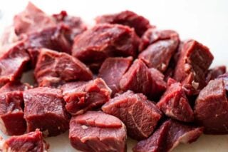 Raw chuck roast cut into 1-2 inch pieces.
