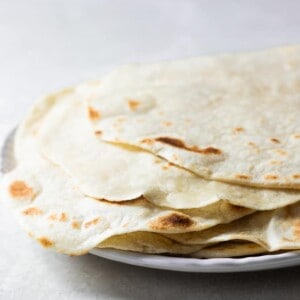 Stack of freshly cooked homemade tortillas.