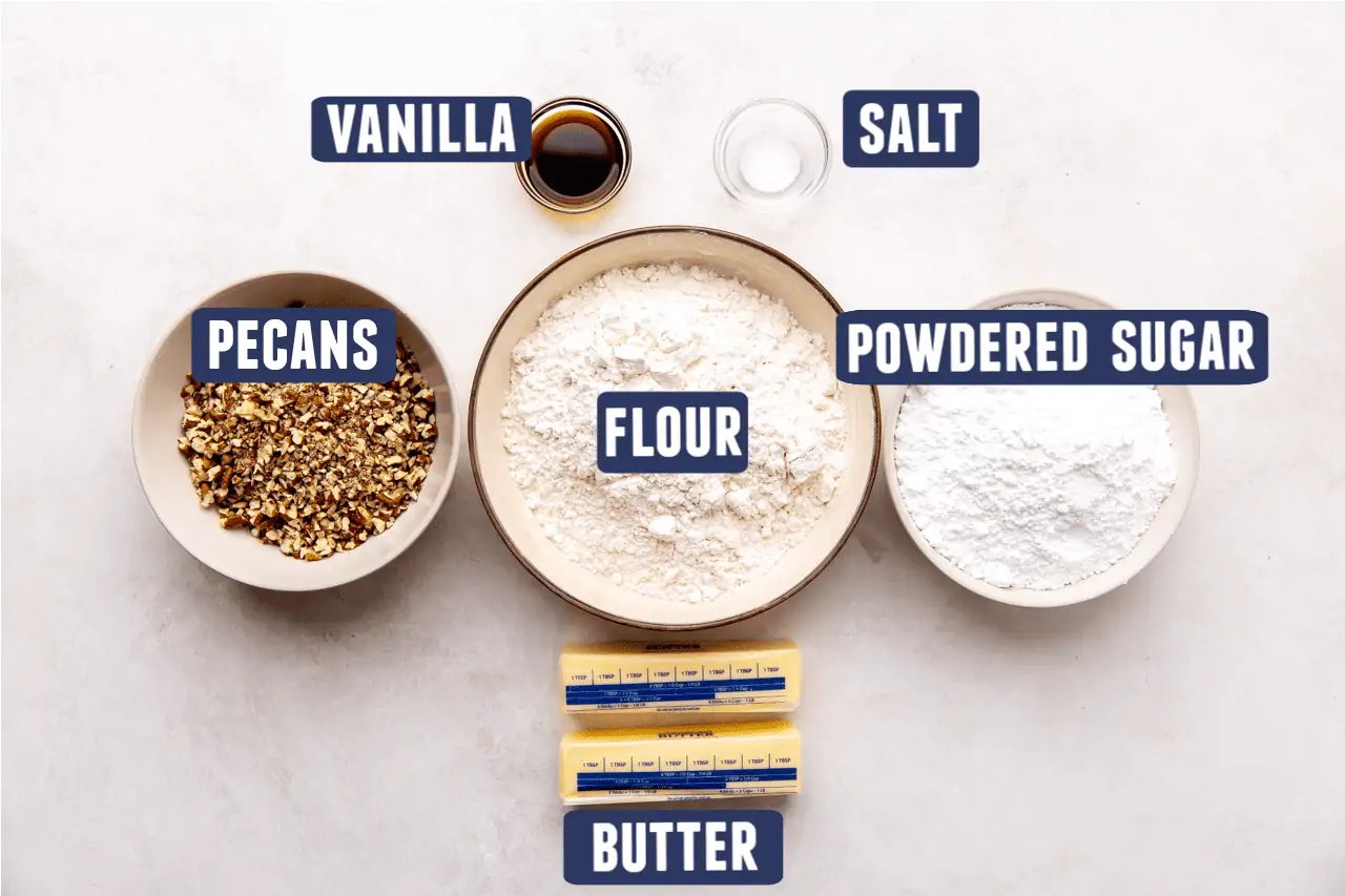 Ingredients needed for making mexican wedding cookies laid out on the counter. 