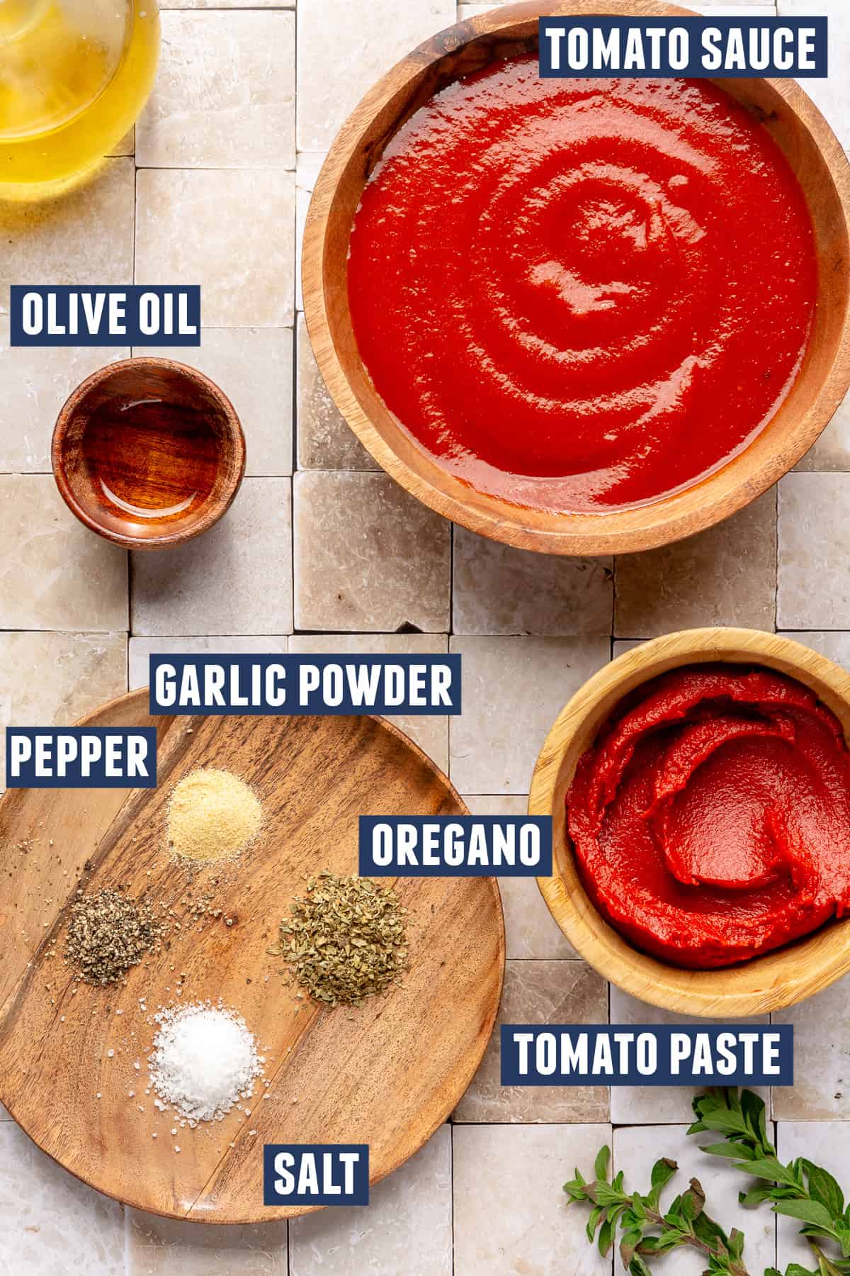 Ingredients needed to make homemade pizza sauce.
