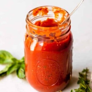 Jar filled with homemade pizza sauce