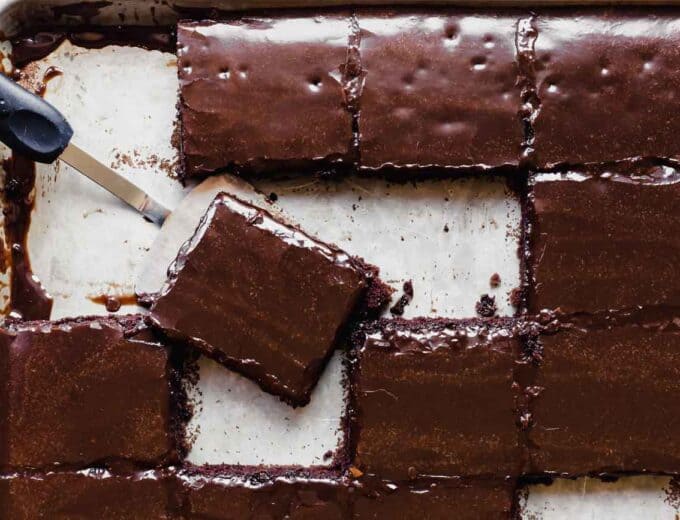 Slices of cut Chocolate sheet cake.