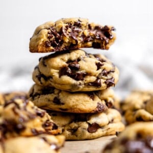 Stack of thick chocolate chip cookies.