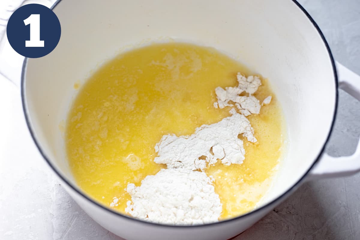 Melted butter in a dutch oven with flour added.