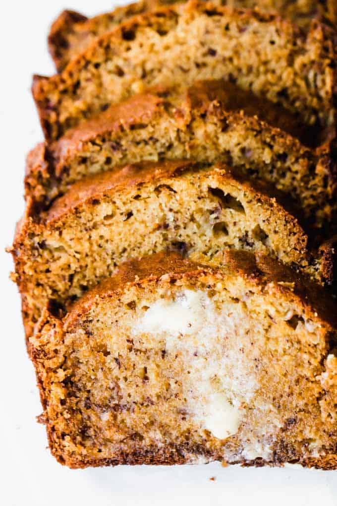 Butter melting on a slice of banana bread.