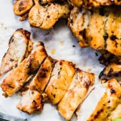 Grilled chicken breast that has been sliced.