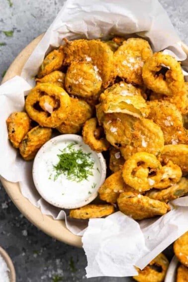 Basket of fried pickles and jalapeños served. with ranch.