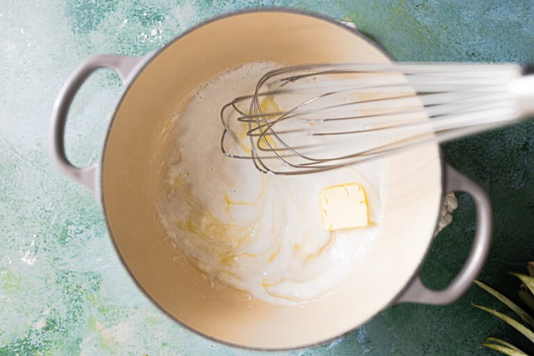 Butter added to a creamy coconut sauce.