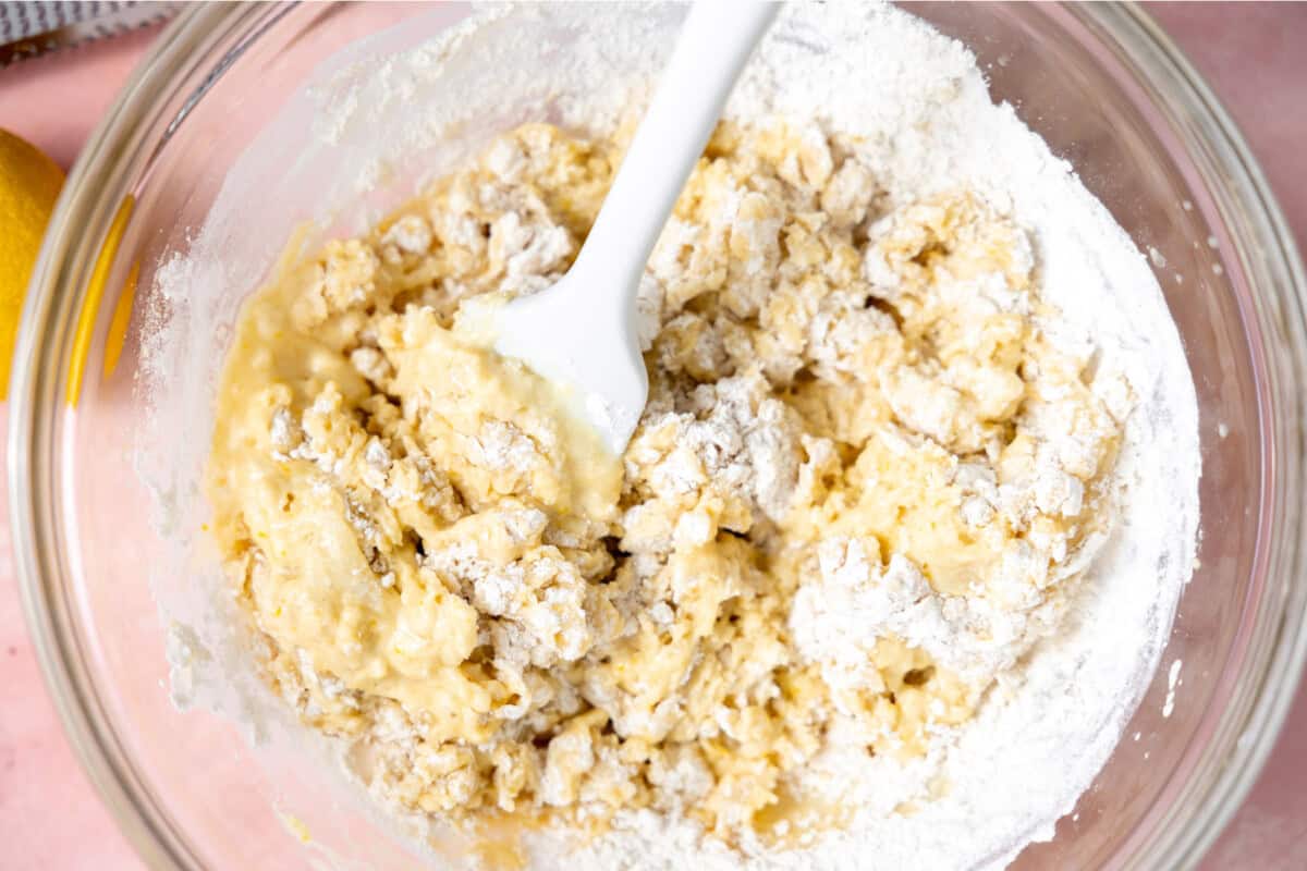 Preparing batter for healthier lemon muffins. 