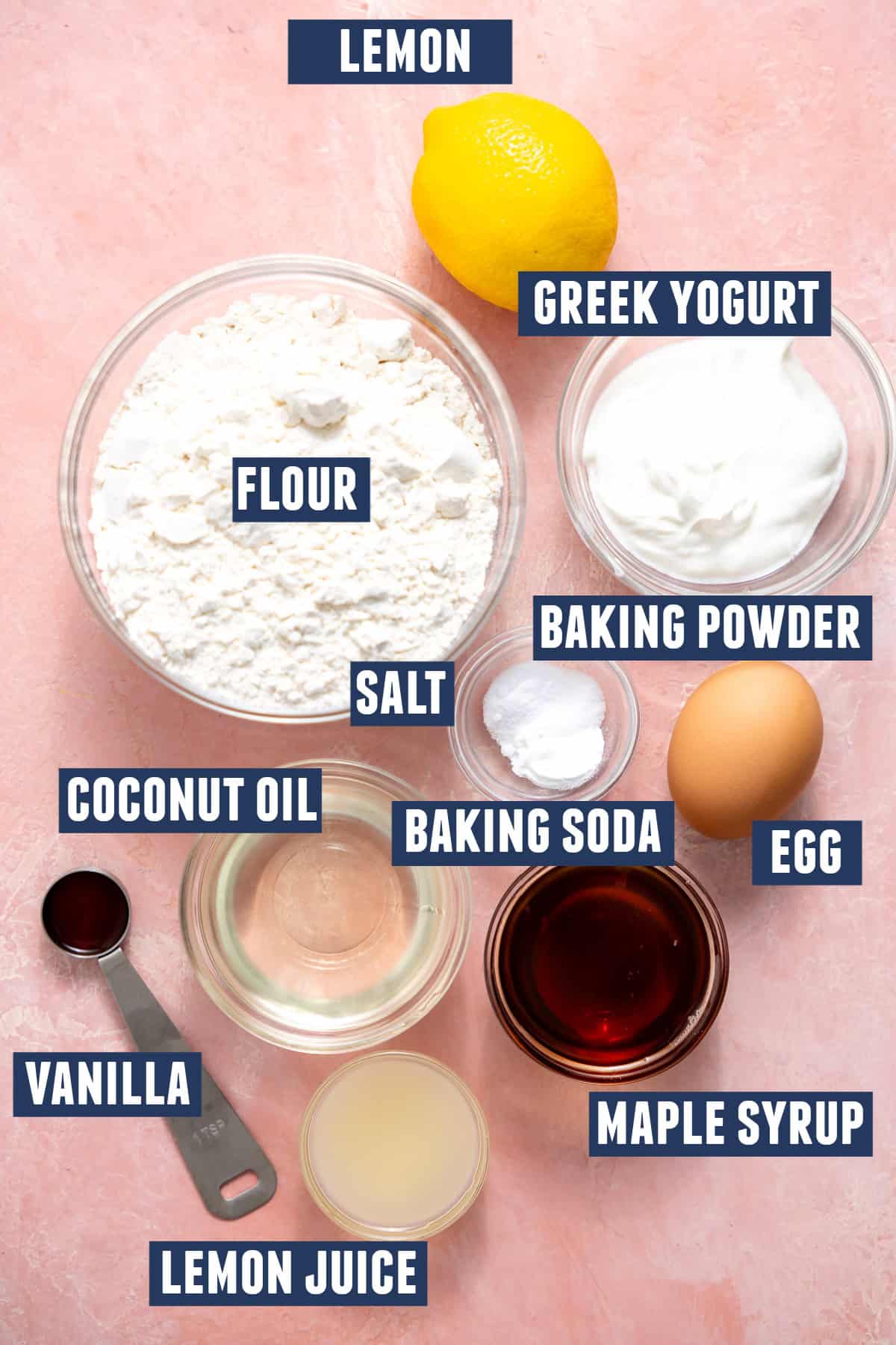 Ingredients needed to make lemon muffins laid out. 