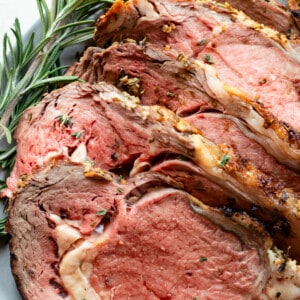 Plate with sliced prime rib ready to be served.
