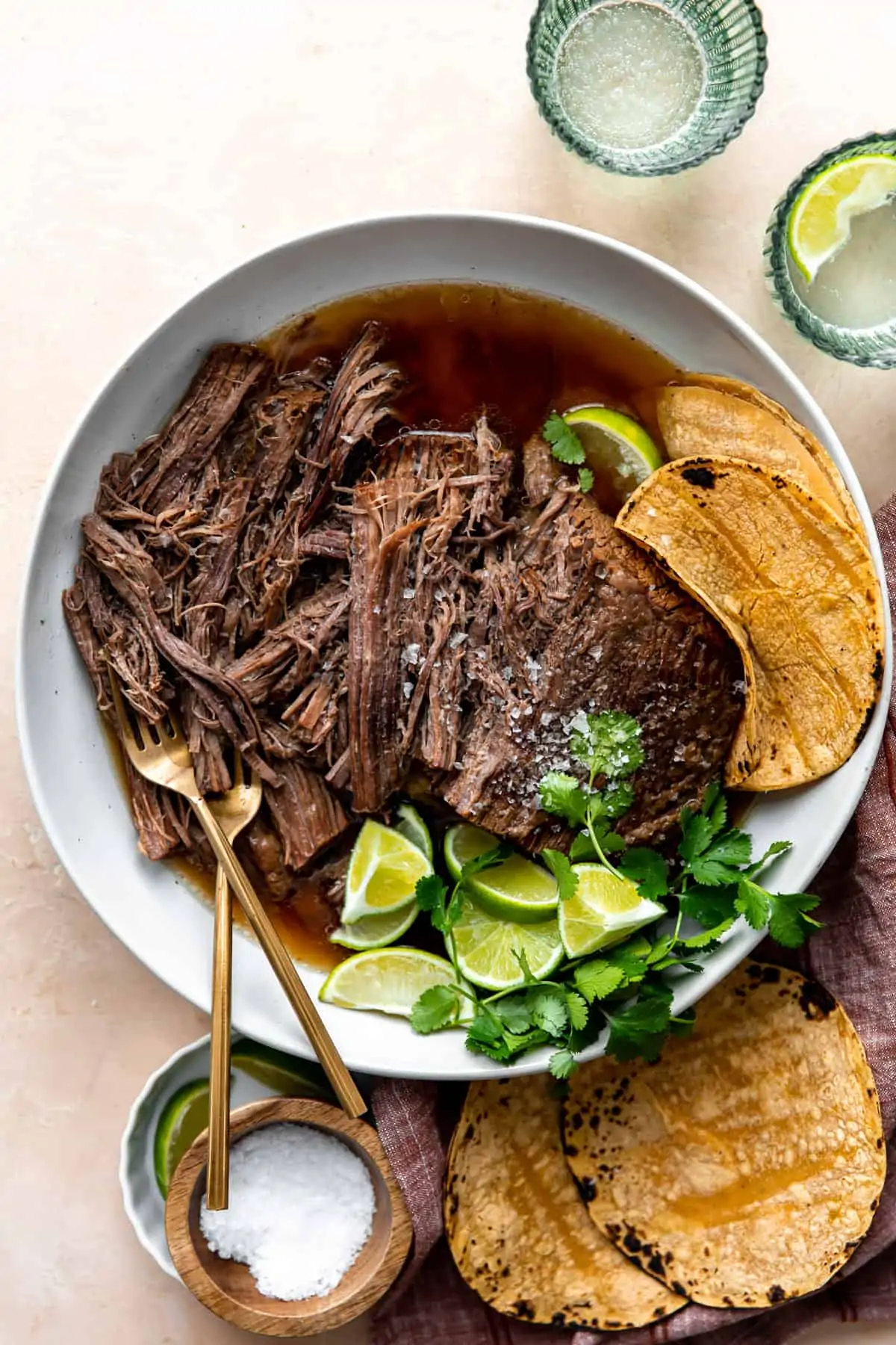 Bowl of shredded Mexican brisket for tacos.