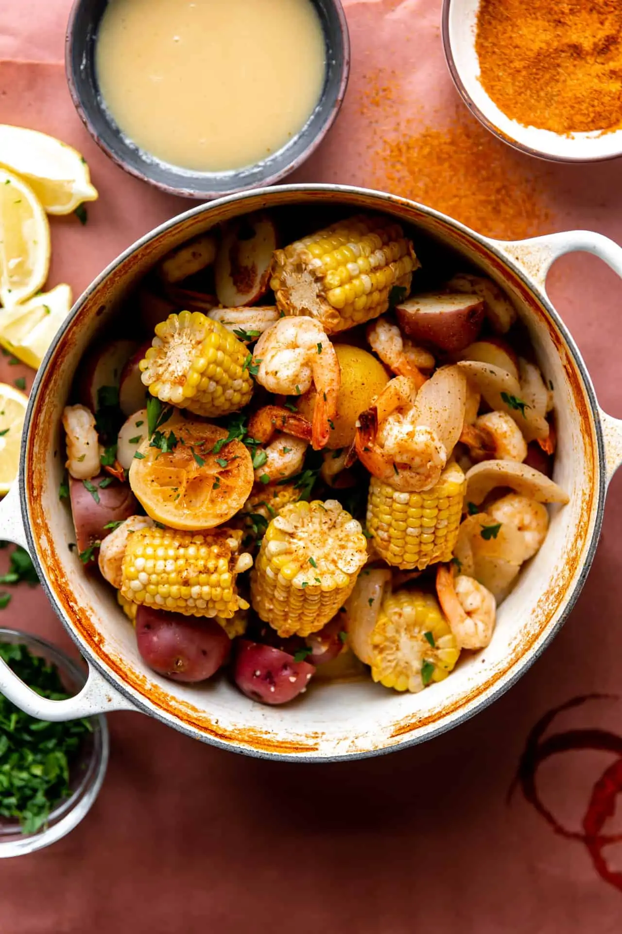 Large pot filled with cooked shrimp boil. 