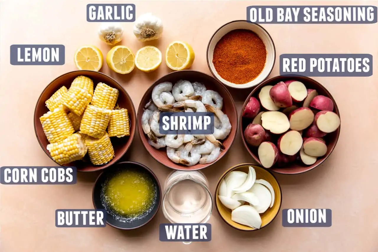 Ingredients needed to make a shrimp boil laid out on the counter.