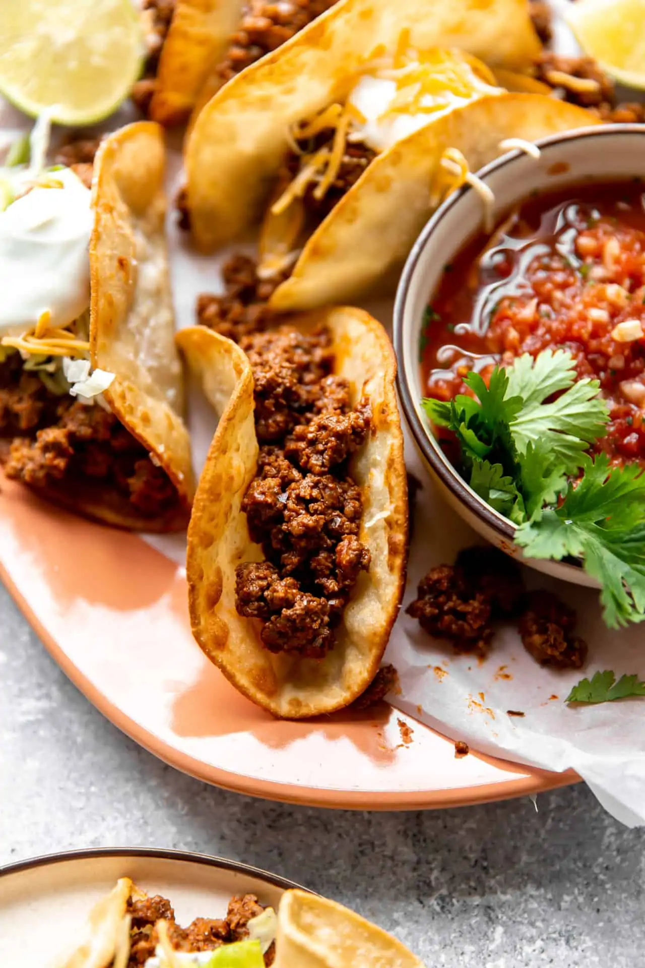Best ever ground beef taco meat loaded into fried corn tortillas.