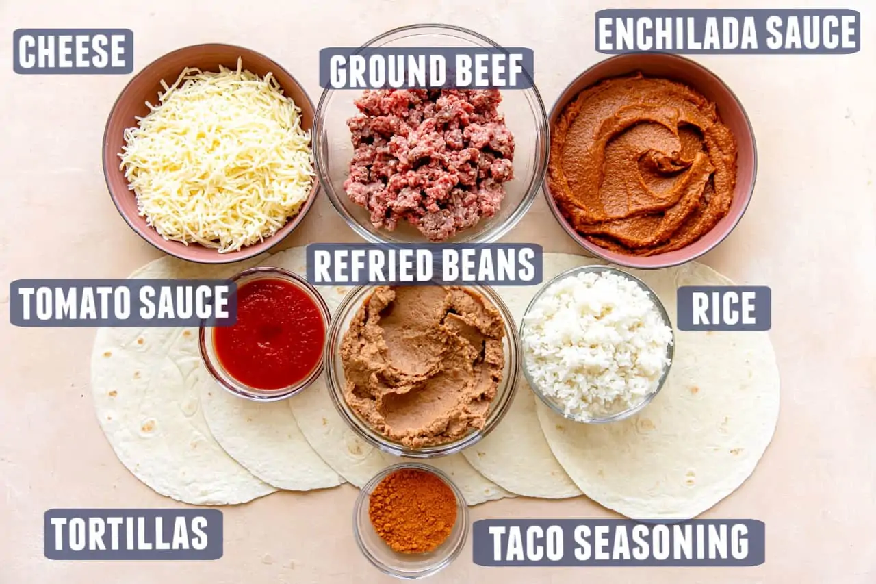 Ingredients needed to make a wet burrito laid out on the counter.