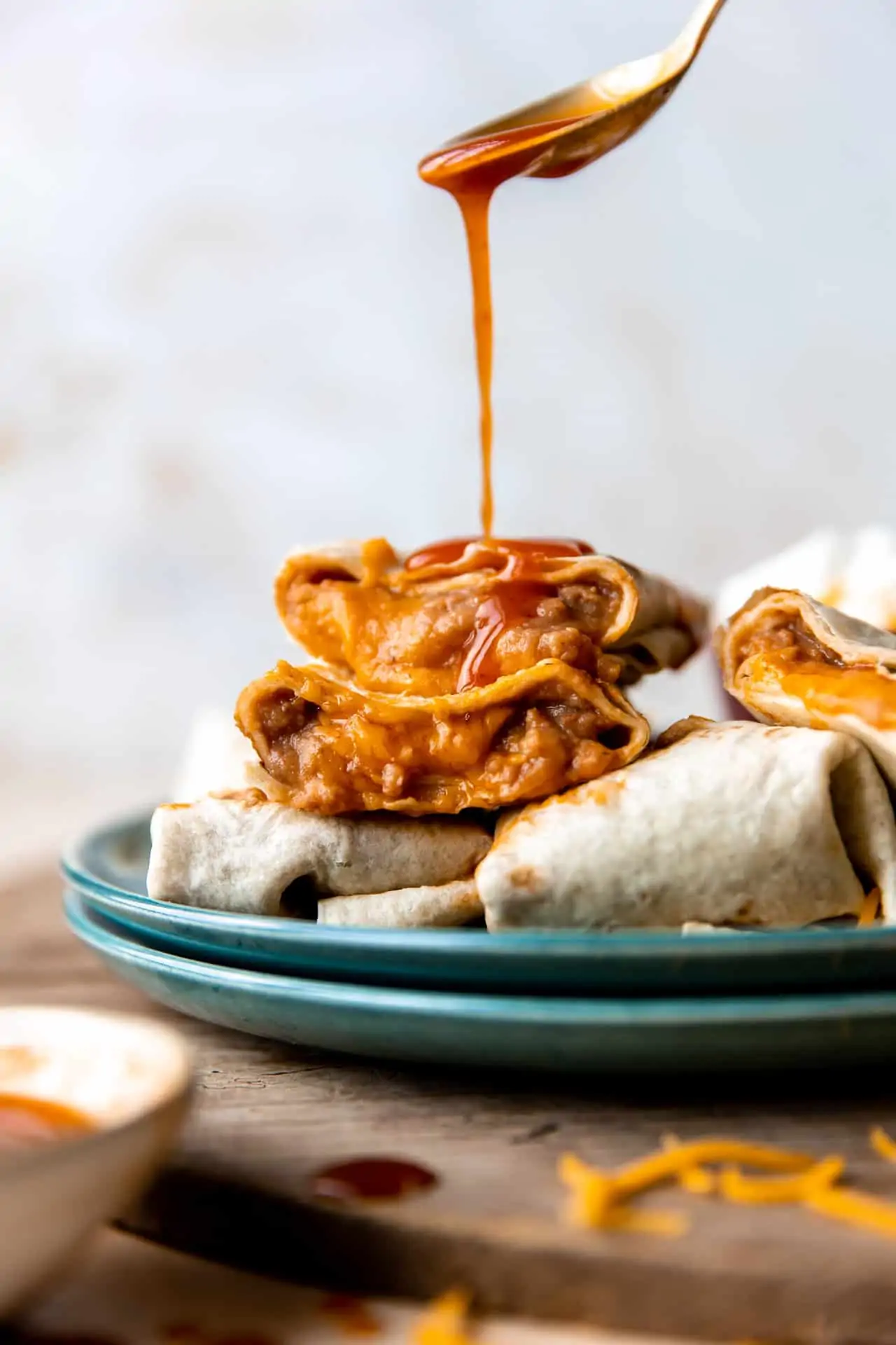 https://houseofyumm.com/wp-content/uploads/2021/09/Bean-and-Cheese-Burrito-10.webp?utm_source=chatgpt.com