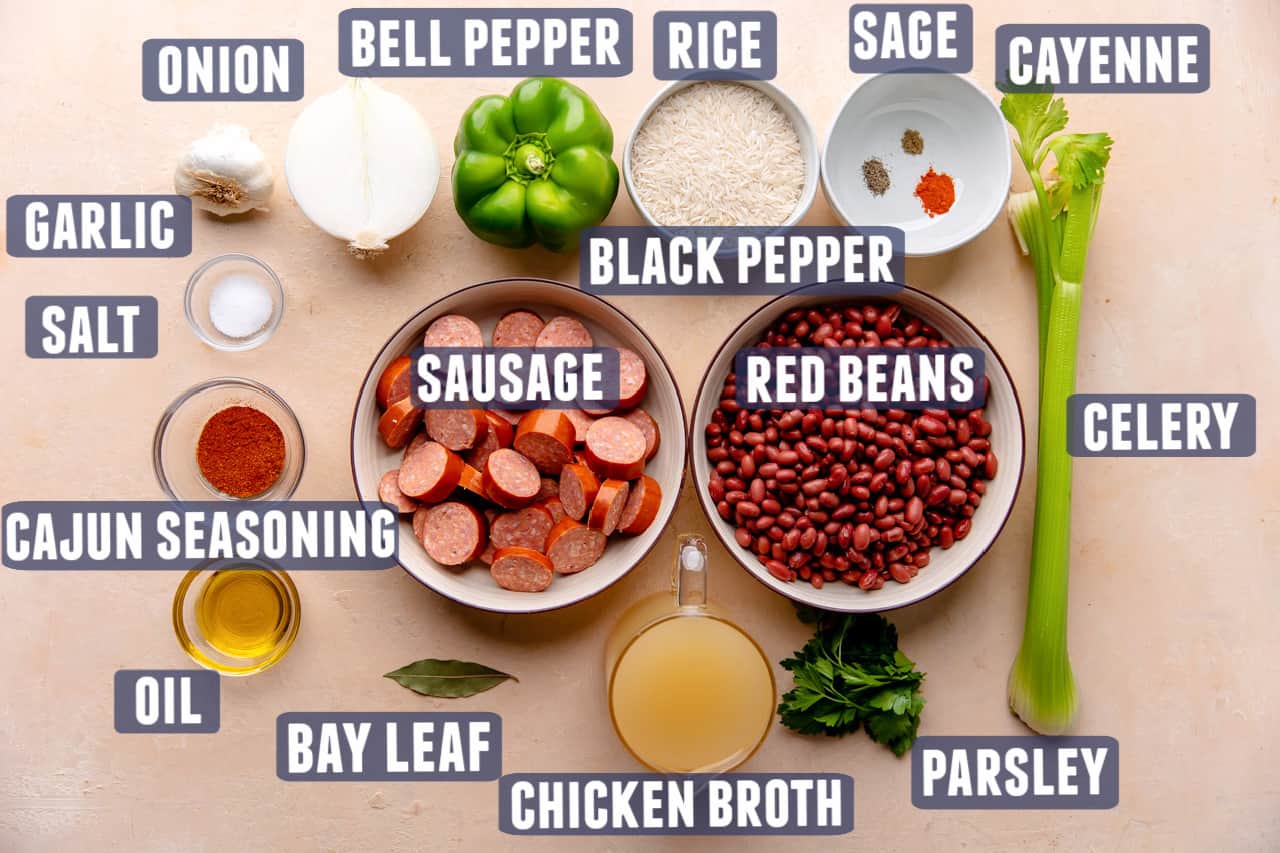 Ingredients needed to make Red beans and rice laid on the counter.