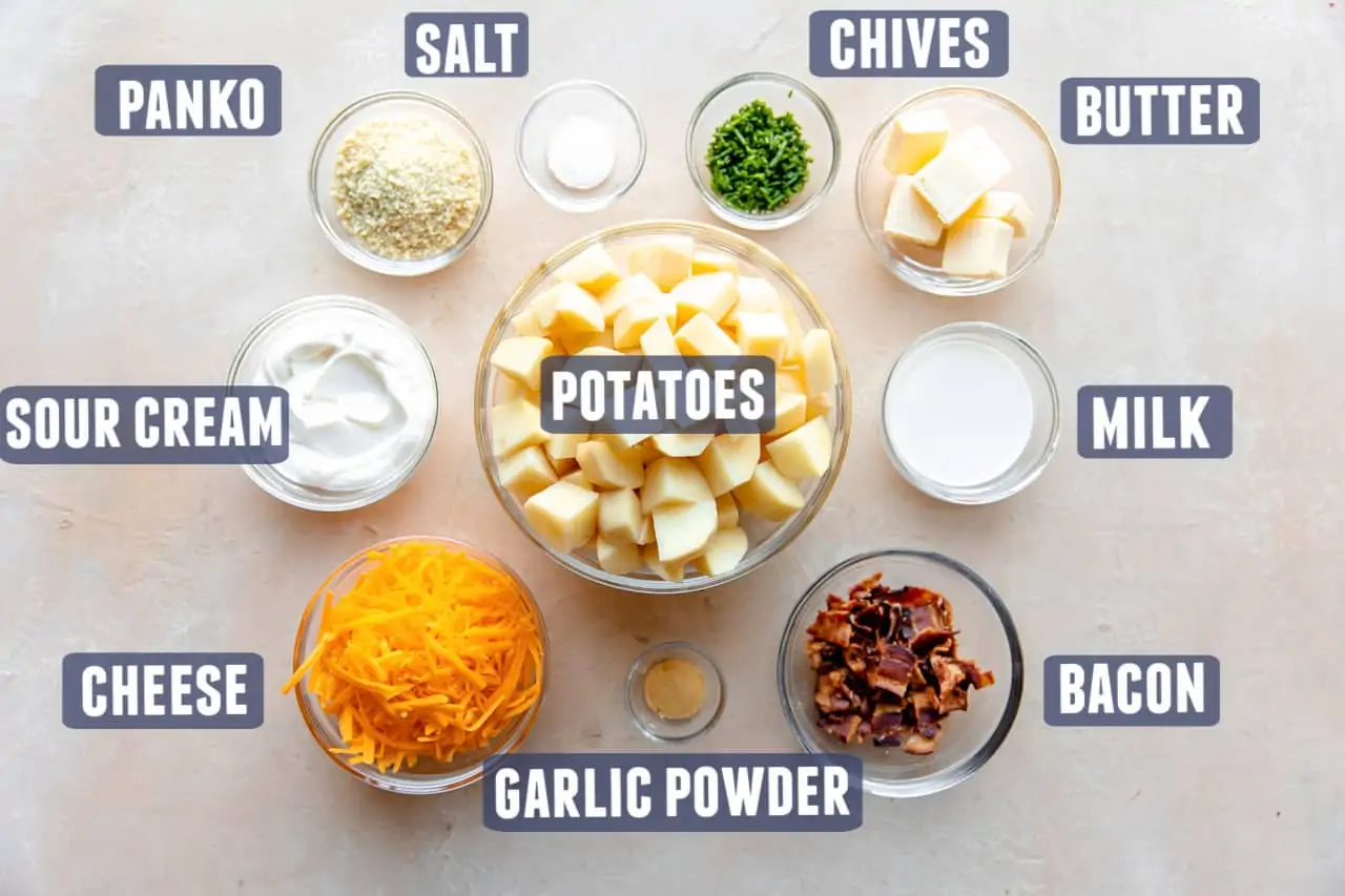 Ingredients needed for mashed potato casserole laid on the counter.