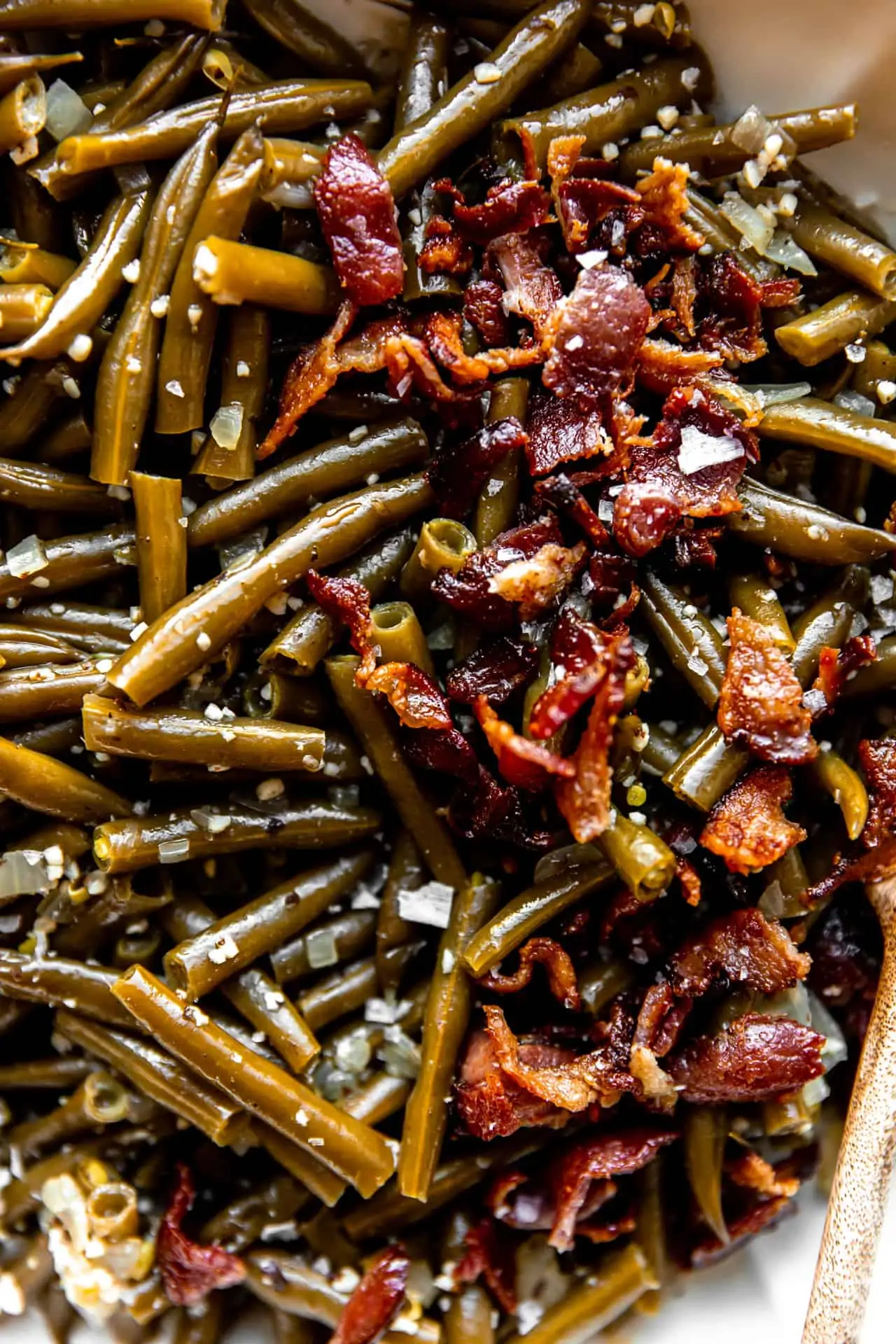 Crispy bacon added on top of slow simmered green beans.