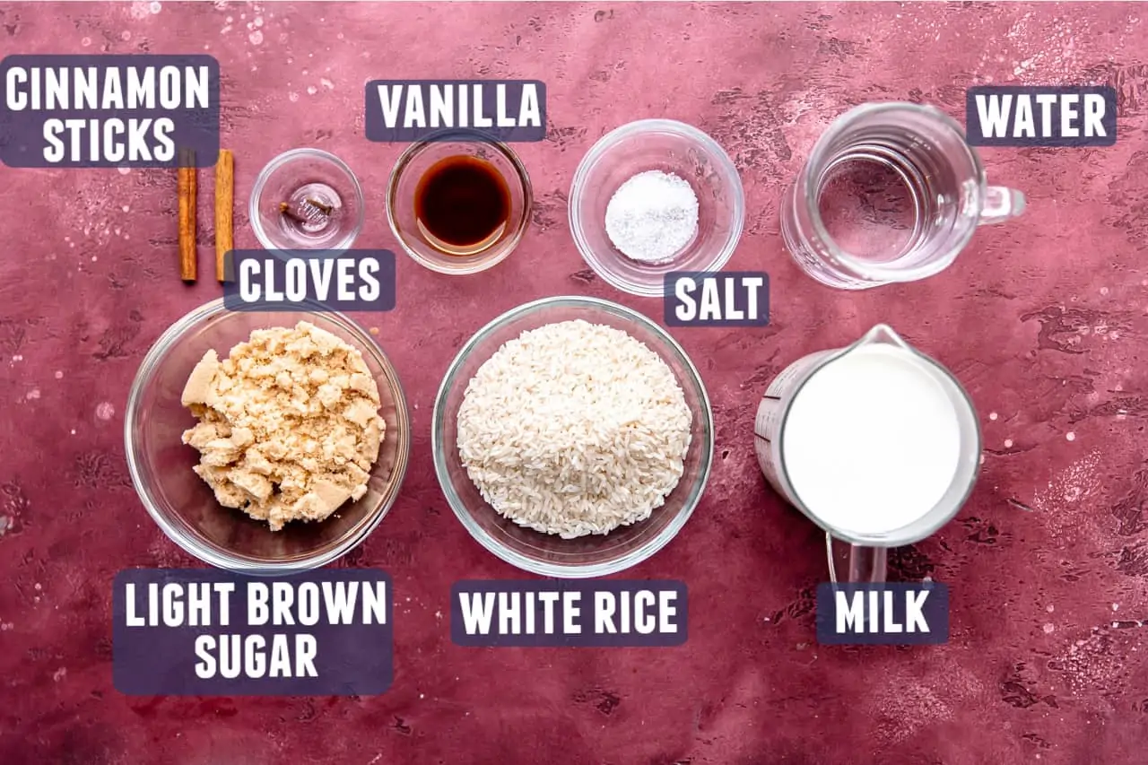 Ingredients needed to make arroz con Leche, or rice pudding, laid out on the counter.