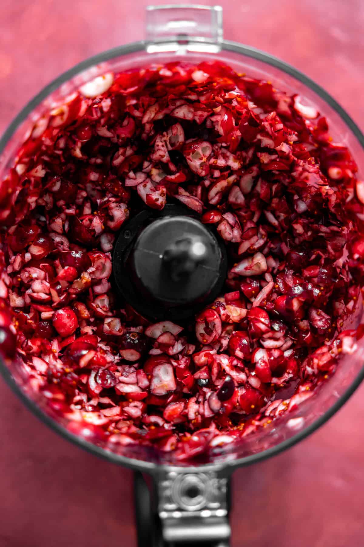 Cranberries in a food processor.