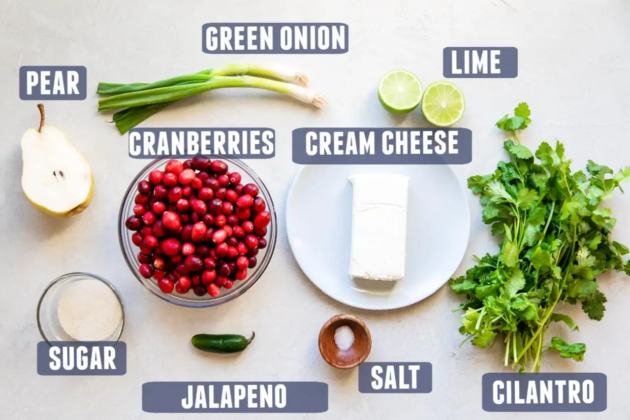Ingredients needed to make cranberry salsa laid out on the counter