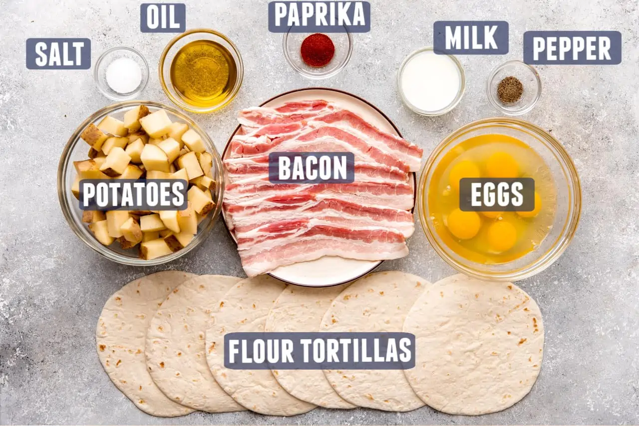 Ingredients needed to make breakfast tacos laid out on the counter.